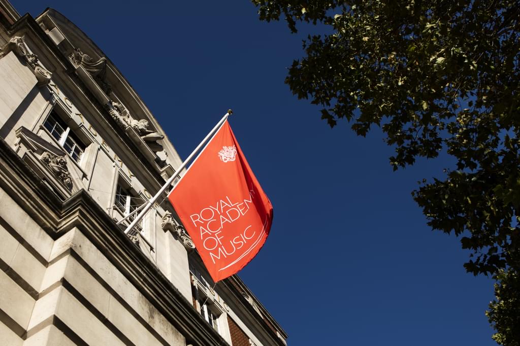 The Academy Flag outside the front of the building during the day