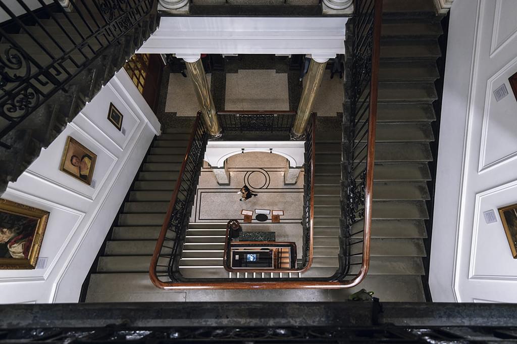 A view of the main Academy Stairwell looking down from the top floor
