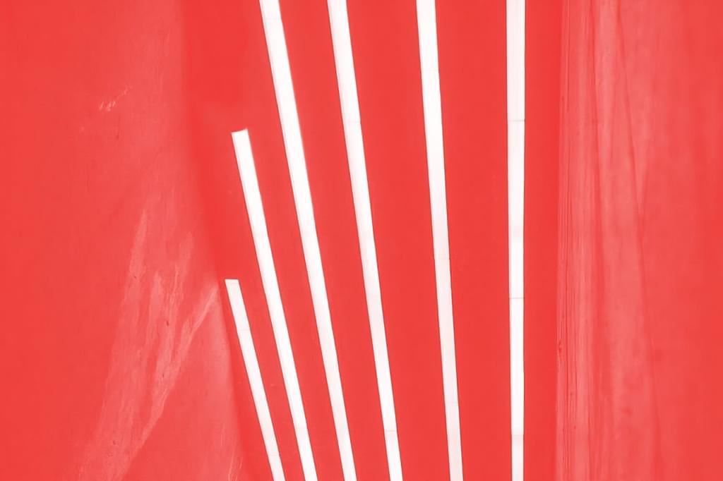 A decorative image of abstract red and white lights
