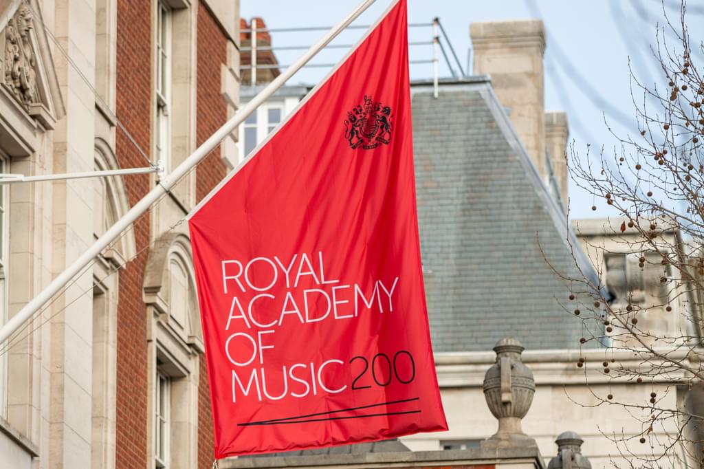 The bicentenary flag flies outside the front of the Academy building