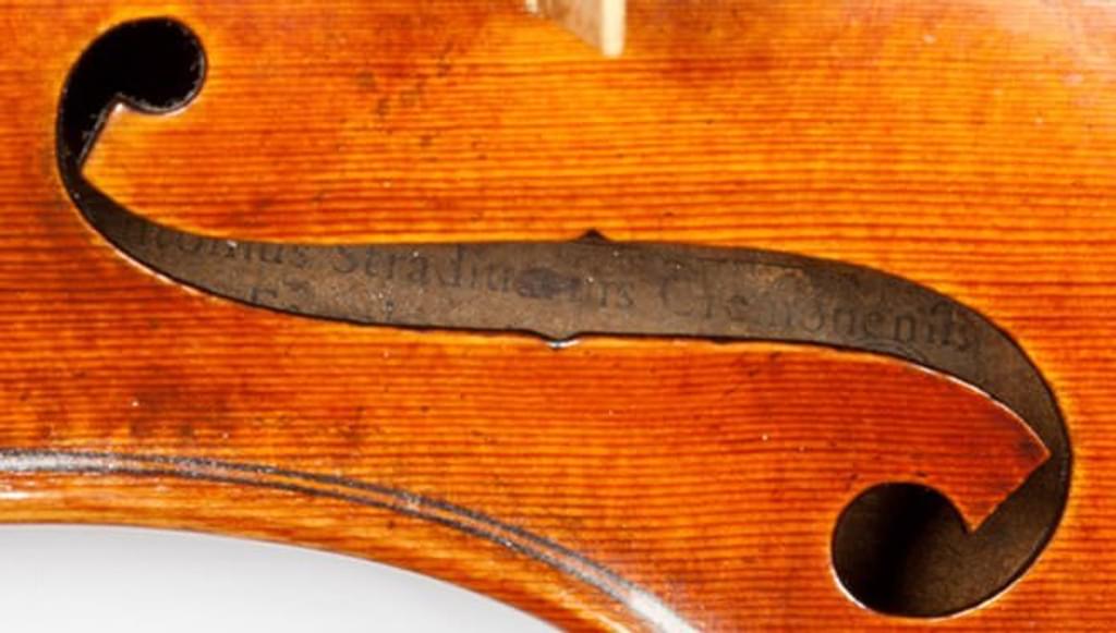 Close up of the 'f' hole from a violin in the Rutson collection.