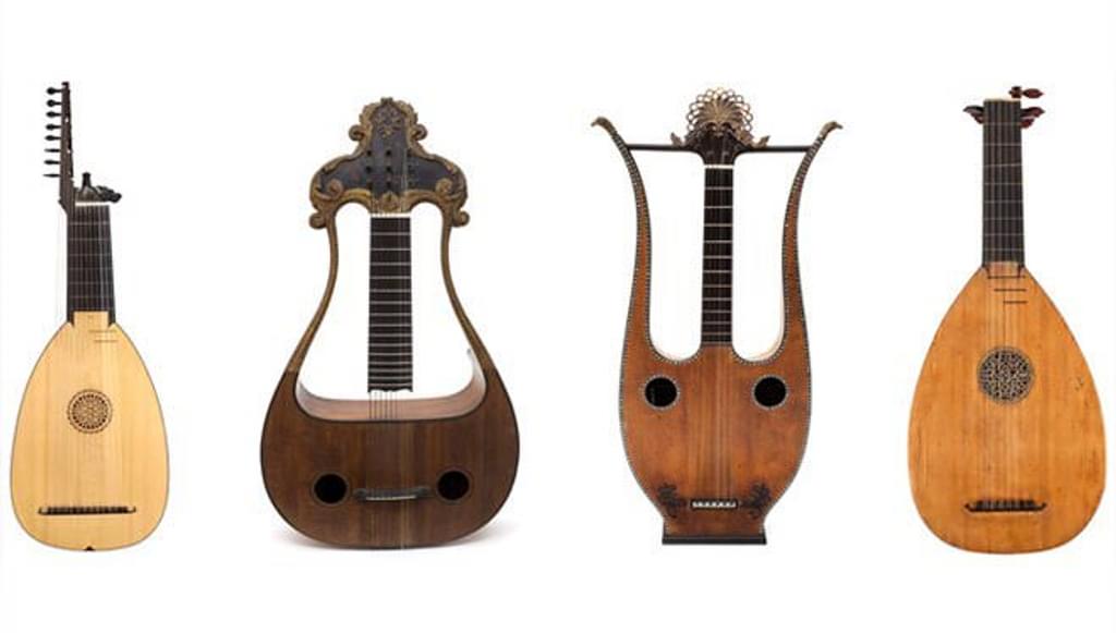 Assortment of four different historicalstringed instruments from the Spencer collection.