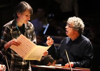 Semyon Bychkov discusses sheet music with another musician
