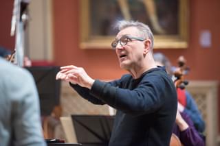 Trevor Pinnock conducting as a rehearsal