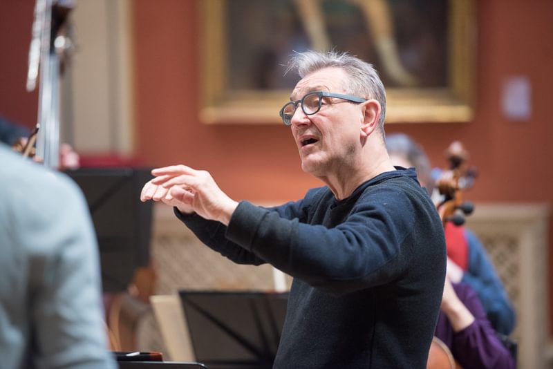 Trevor Pinnock conducting as a rehearsal