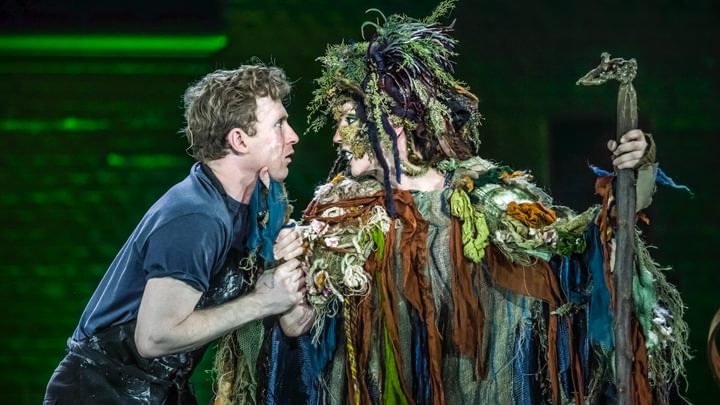 Two musical theatre actors performing a scene in costume