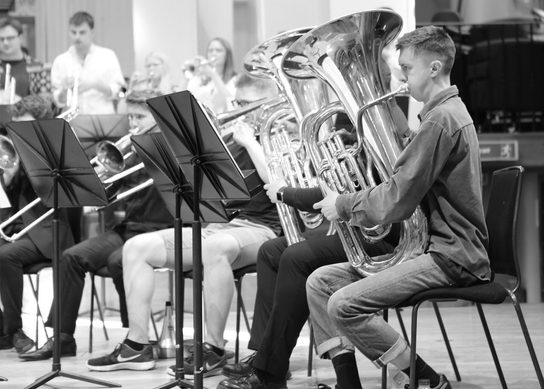 Academy Symphonic Brass playing tuba