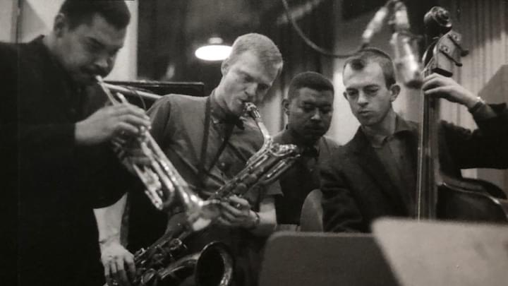 Black and white photo of jazz quartet playing