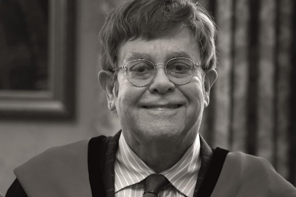 Elton John smiles for camera