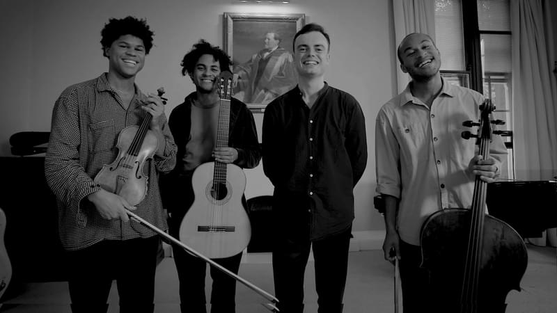 The Fantasia Orchestra smile to camera