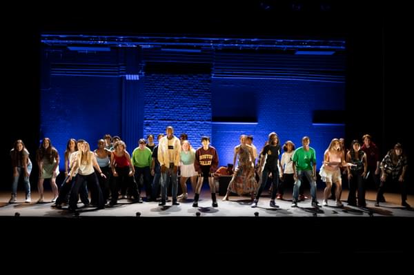 A group of Junior Academy Musical Theatre Students perform on stage