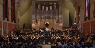 The Academy Symphony Orchestra performing on stage in the Duke's Hall
