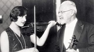 Alma Rose plays violin to Arnold Rose