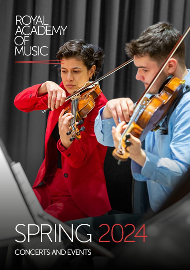 A violin duo in rehearsal