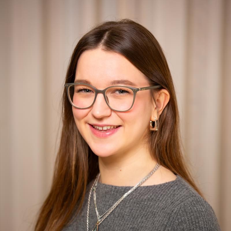 Headshot of Eleanor Killner smiling to camera