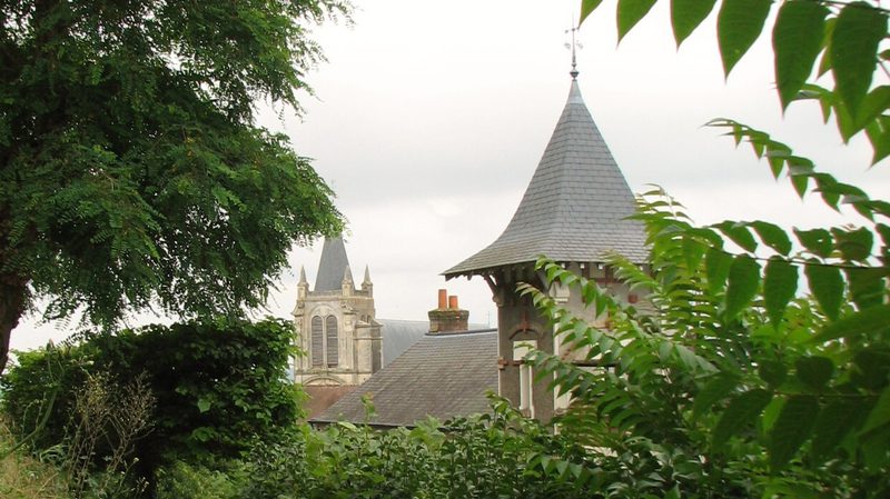 An image of a turret at the top of Maurice Ravel's house through the trees - Le Belvédère, Montfort-l’Amaury (Musée Maurice Ravel)