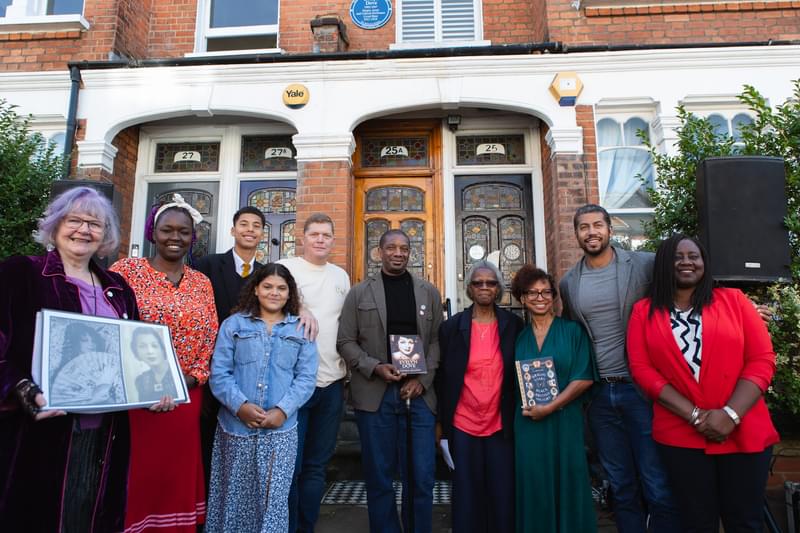 Kemi Akinola, family descendants of Evelyn Dove and Marsha de Cordova pictured with the plaque at Evelyn Dove's former Battersea home