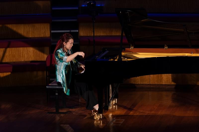 Junyan Chen performing on a grand piano in the Second Round of the Leeds International Piano Competition