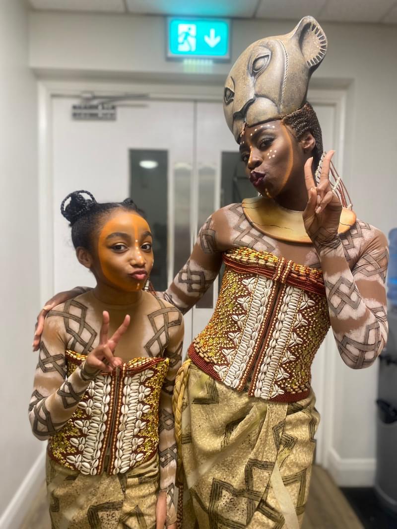 Mia-Nicole Alexander and Merryl Ansah pictured backstage in costume for The Lion King