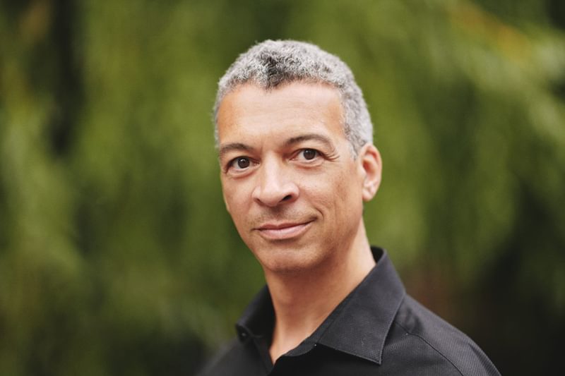 Roderick Williams, looking into the camera, smiling