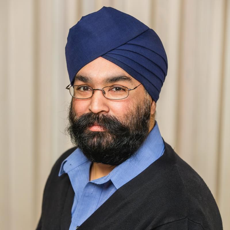 Portrait of Harpell Chatwal smiling to camera